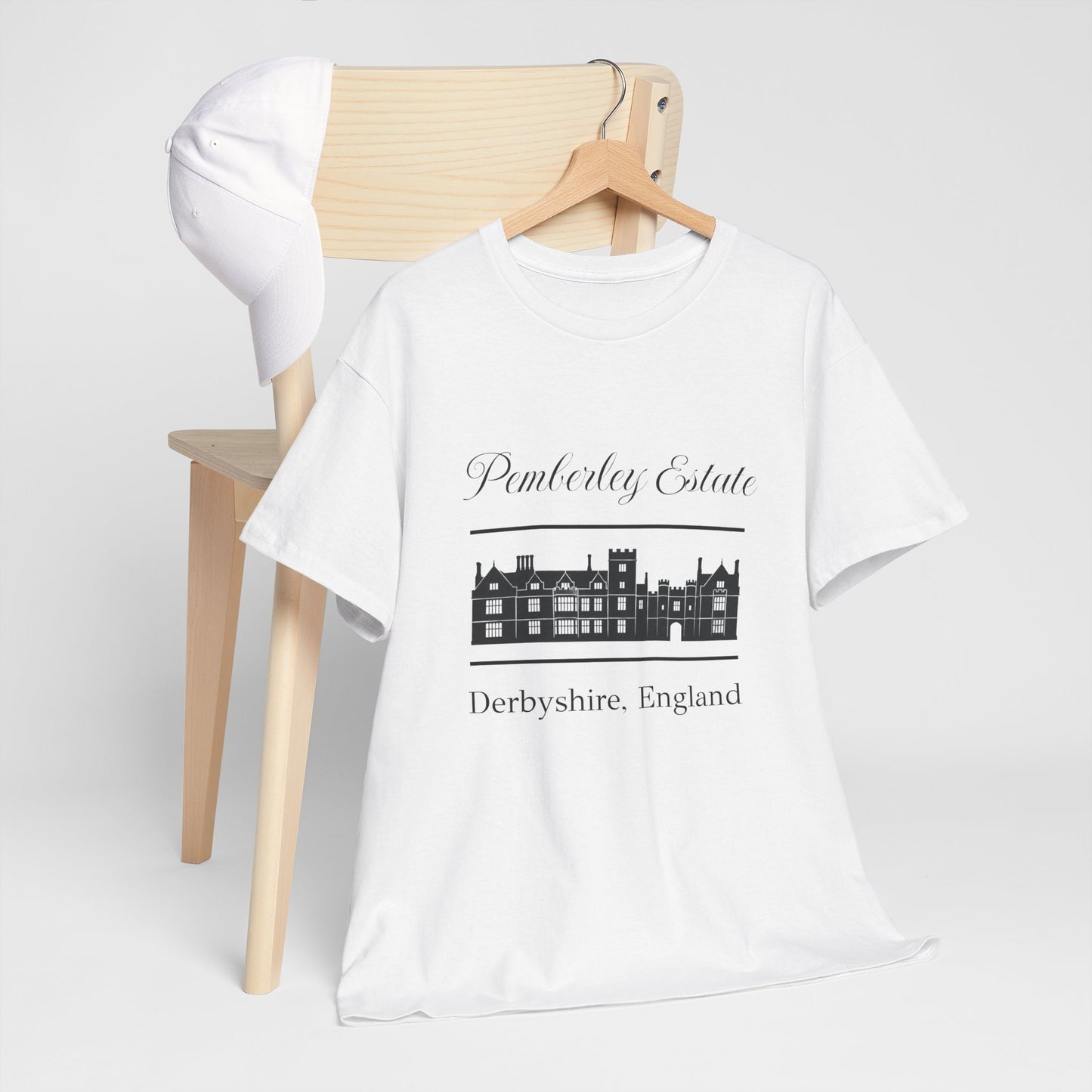 White t-shirt with Pemberley Estate Derbyshire, England design on a wooden chair.