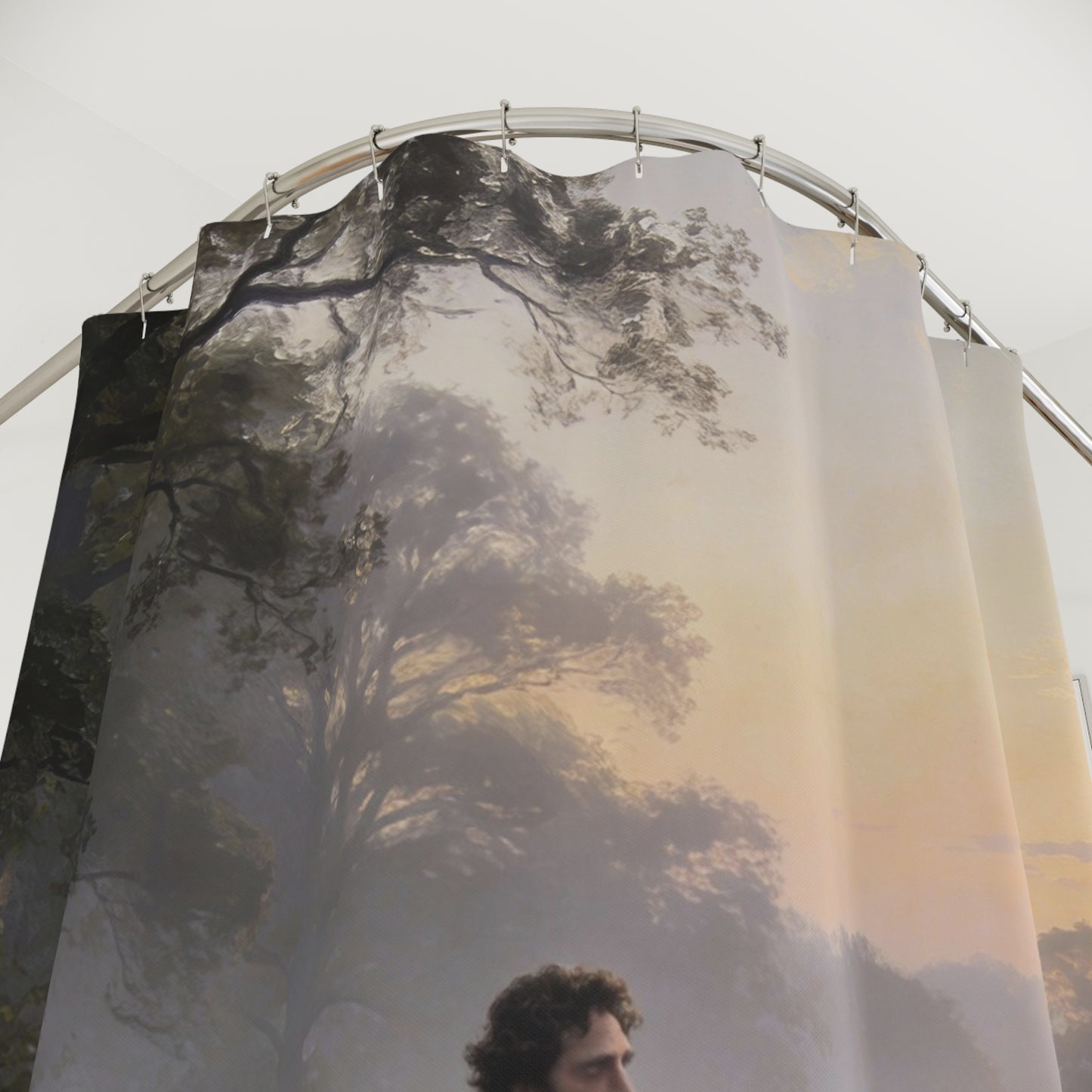 Shower curtain with nature design featuring trees and a person.