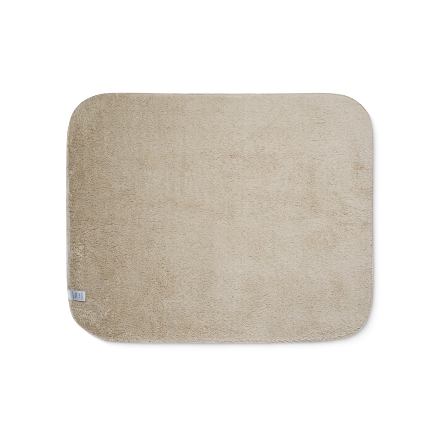 Beige sherpa blanket on a white background