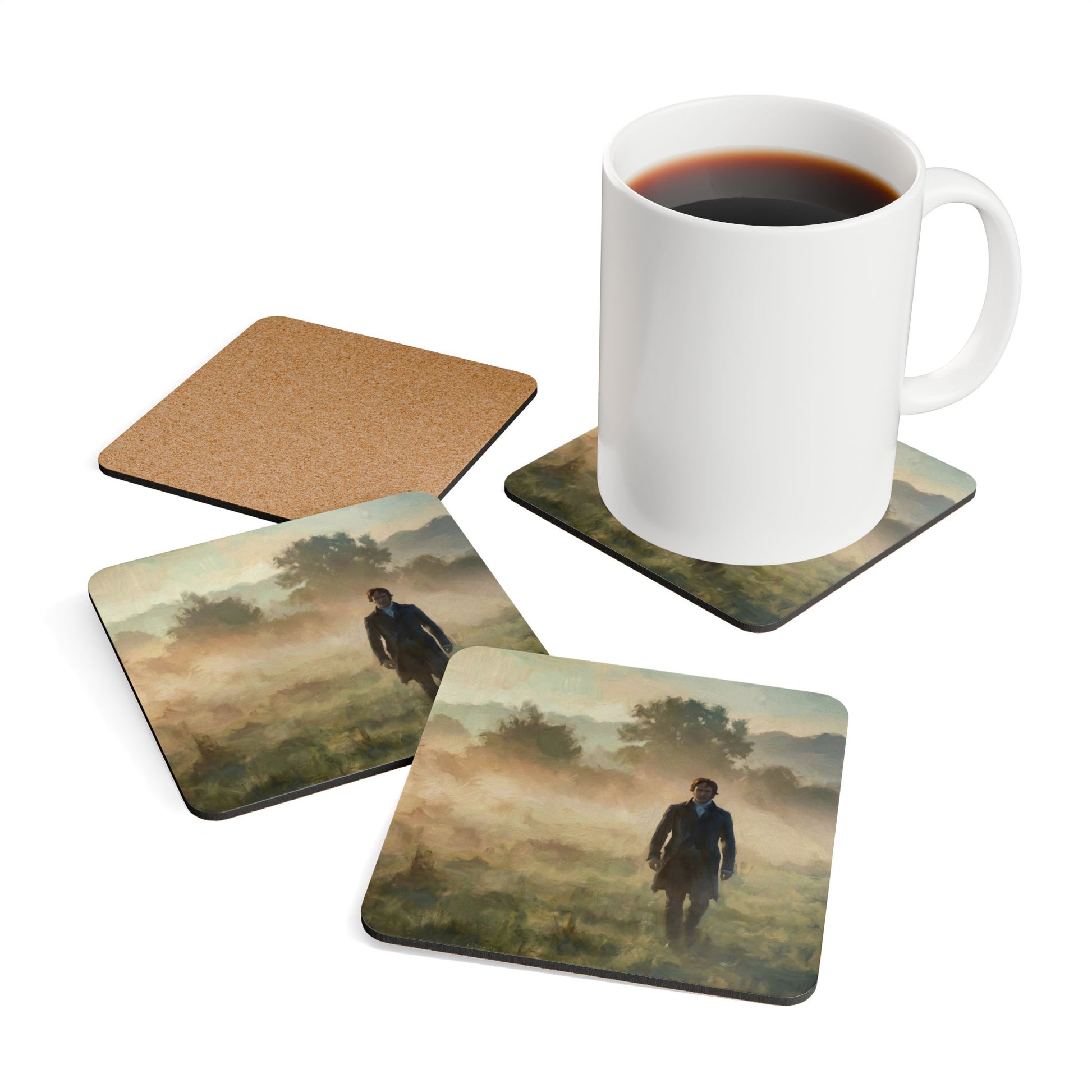 Set of four coasters with scenic designs and a white mug on a white background