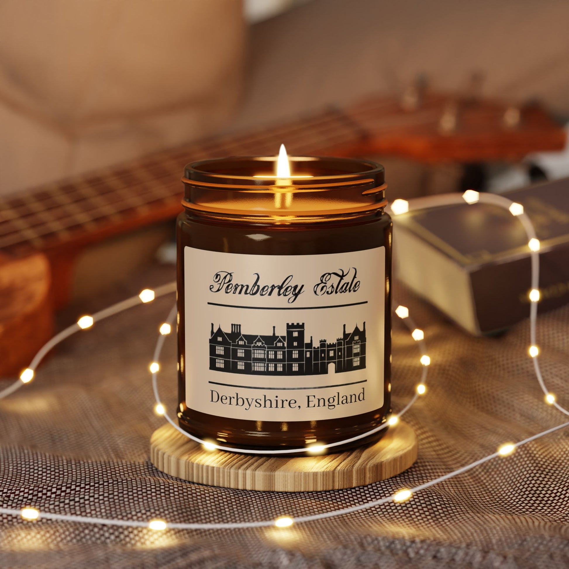 Pemberley Estate Derbyshire England with building black text on candle lit with lights